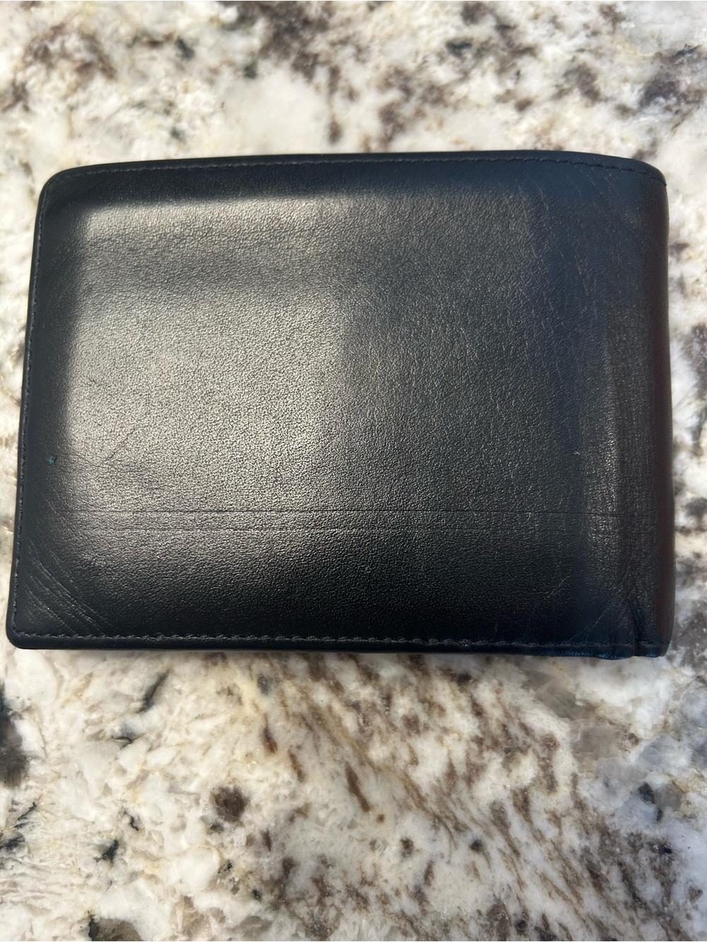 Tumi Black Leather Bi-Fold Wallet